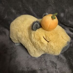 Adorable Tan Capybara Plush with Orange Accent
